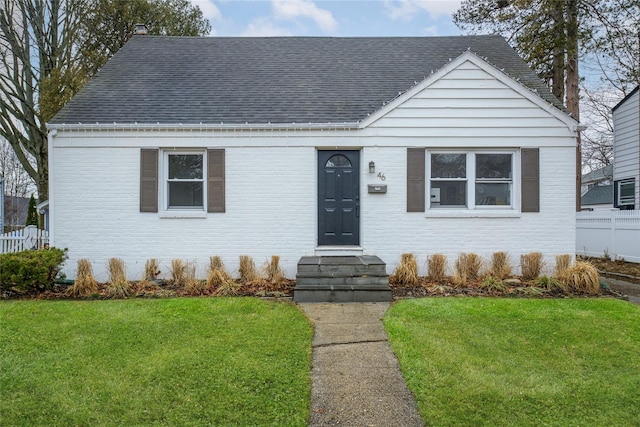 view of front of home with a front yard