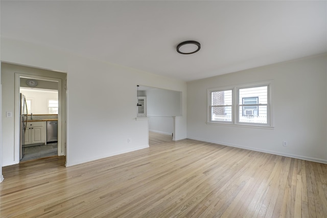 unfurnished living room featuring light hardwood / wood-style floors