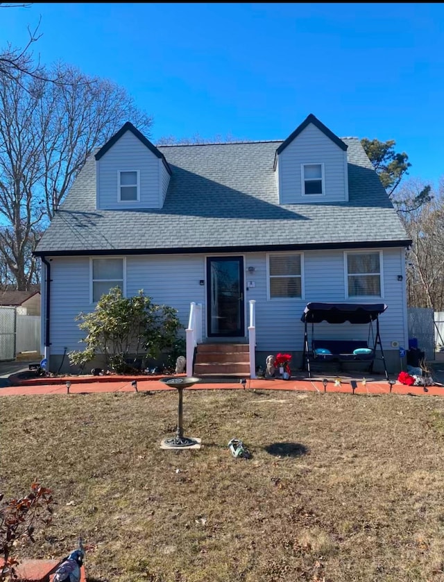 view of front of home featuring a front lawn