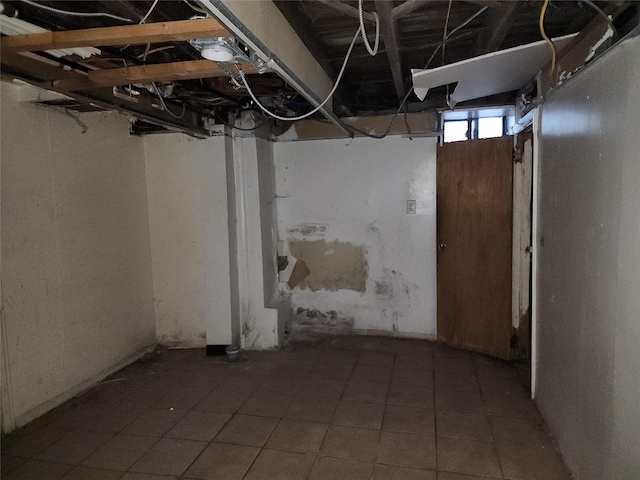 basement featuring tile patterned floors