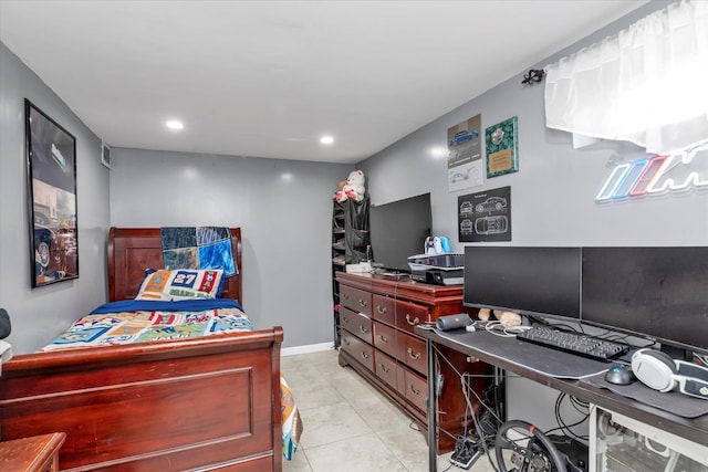 bedroom featuring light tile patterned floors