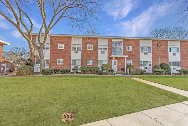 view of front of property with a front lawn