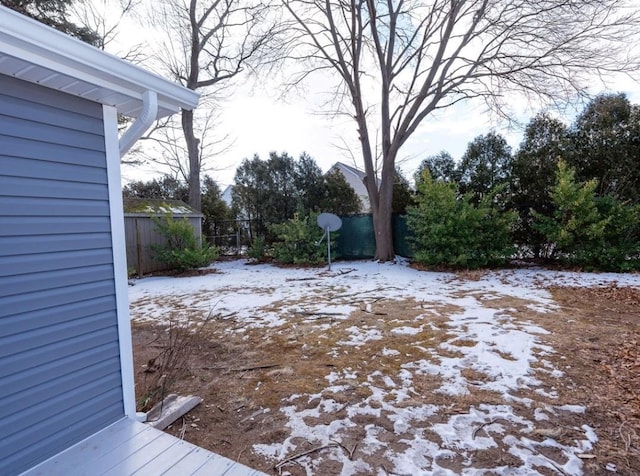 view of yard covered in snow