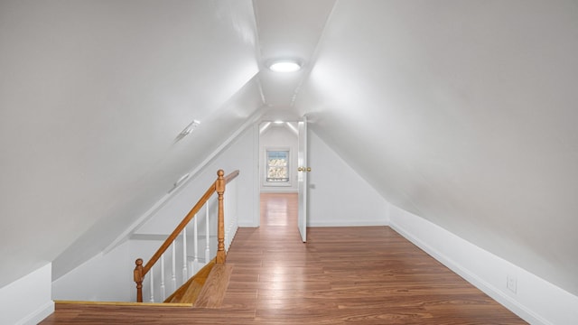 interior space featuring vaulted ceiling and hardwood / wood-style floors