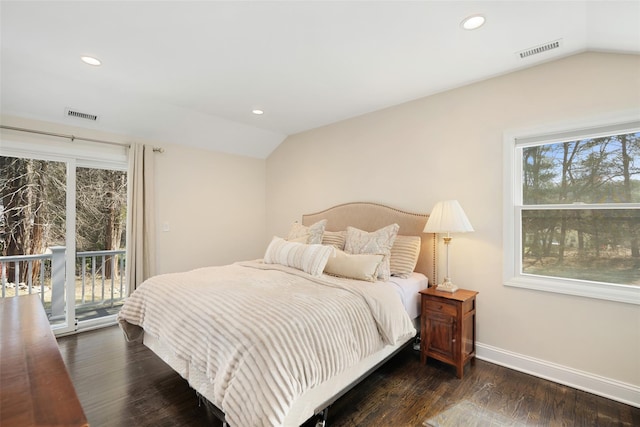 bedroom featuring access to exterior, visible vents, baseboards, lofted ceiling, and wood finished floors