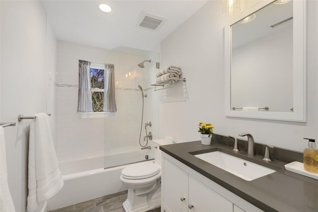 full bath featuring vanity, toilet, visible vents, and shower / washtub combination