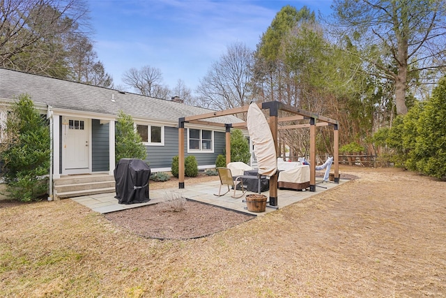 back of house featuring fence, a pergola, a chimney, outdoor lounge area, and a patio area