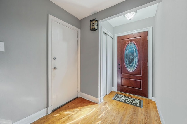 entryway with light hardwood / wood-style flooring