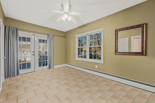 empty room featuring a baseboard heating unit, light tile patterned floors, ceiling fan, and french doors