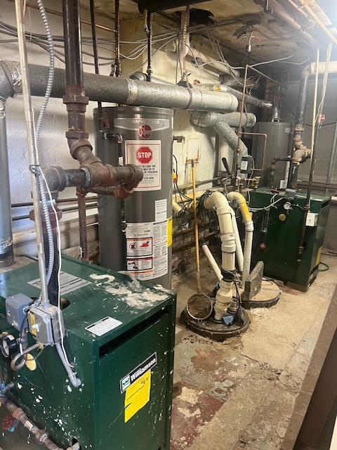 utility room featuring gas water heater