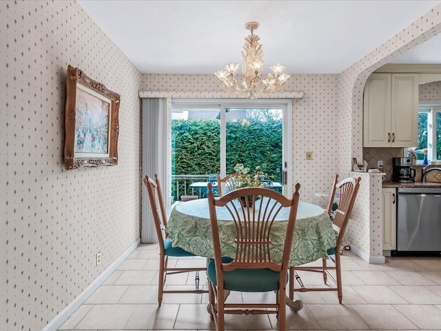 80-51 Little Neck Pkwy, Glen Oaks, NY 11004 - dining room with wallpapered walls, a chandelier, baseboards, plenty of natural light, and light tile patterned floors