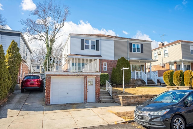 front of property with a garage