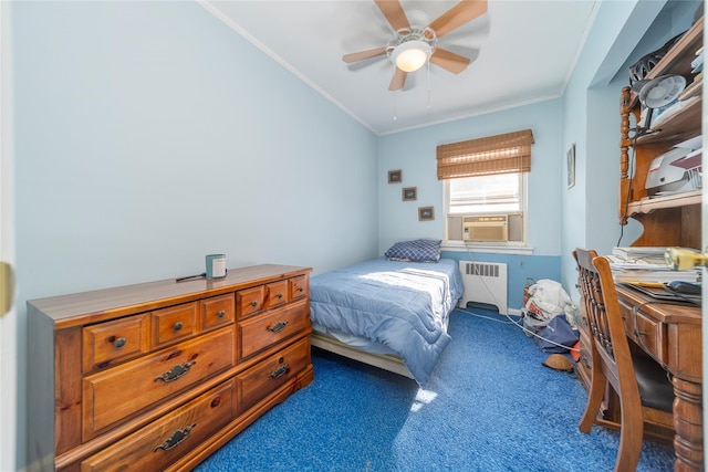 bedroom with ornamental molding, radiator heating unit, ceiling fan, and dark carpet