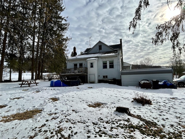 view of snow covered house