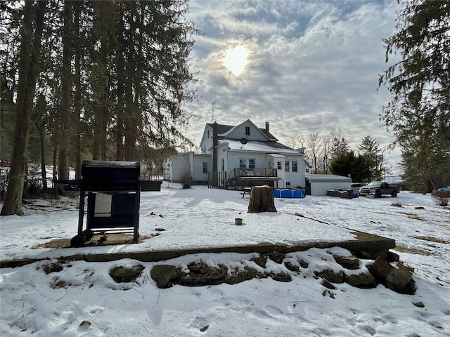 view of snow covered property