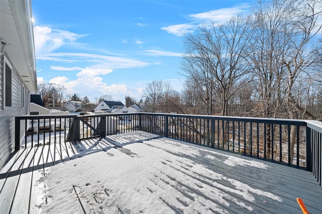 view of snow covered deck