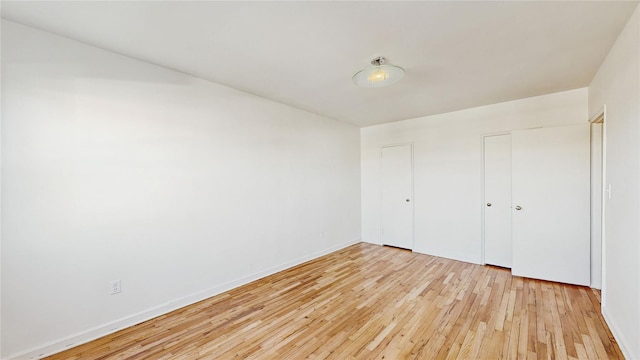 unfurnished bedroom featuring light hardwood / wood-style flooring