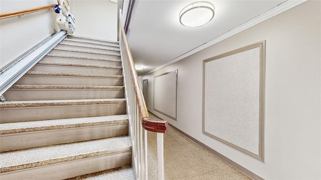 staircase with ornamental molding