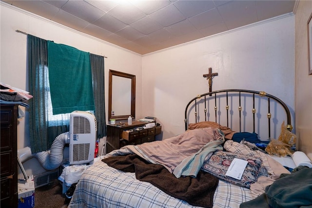 bedroom with crown molding