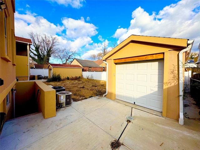 garage featuring central AC unit