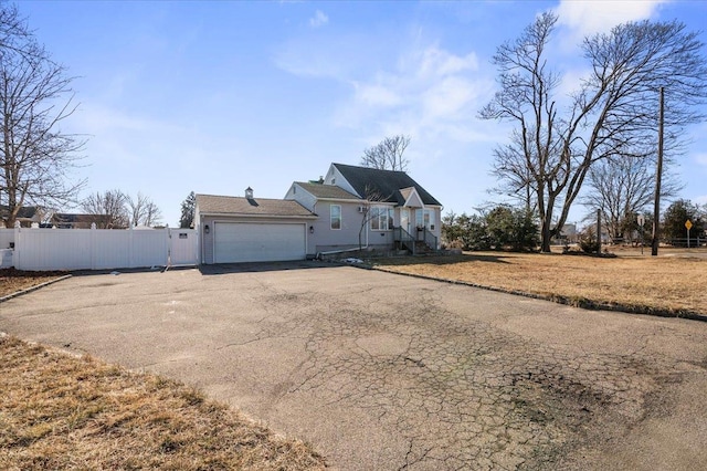 view of property exterior with a garage