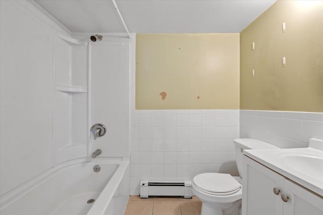 full bathroom with a baseboard radiator, vanity, tile patterned flooring, and tile walls