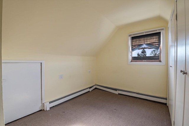 bonus room with light colored carpet and lofted ceiling