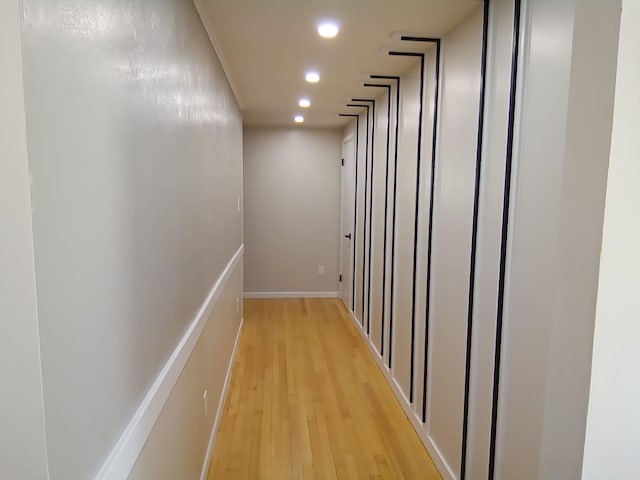 corridor featuring light hardwood / wood-style floors