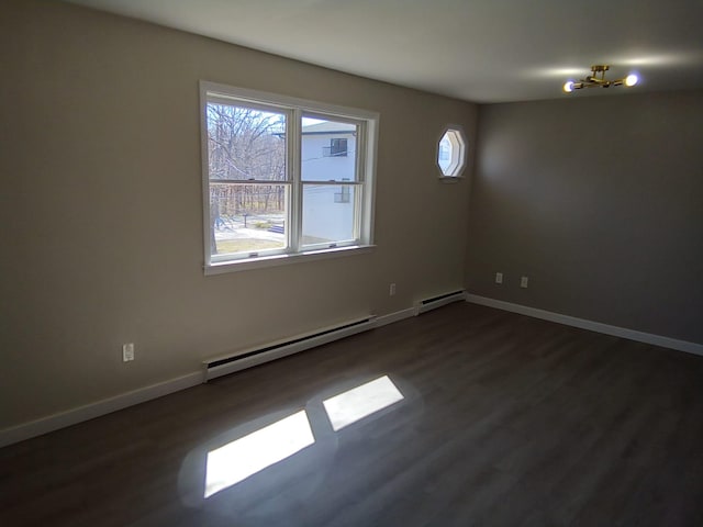 129 Franklin Ave, Monroe, NY 10950 - unfurnished room with dark hardwood / wood-style flooring, plenty of natural light, and baseboard heating