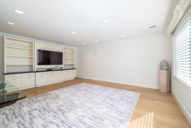 living room featuring light wood-type flooring