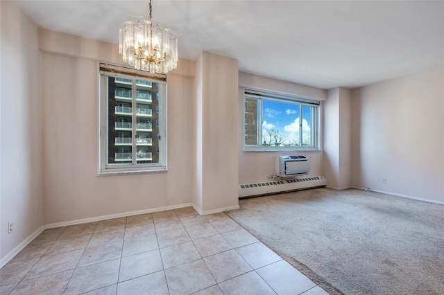 empty room with a notable chandelier, light colored carpet, an AC wall unit, and baseboard heating