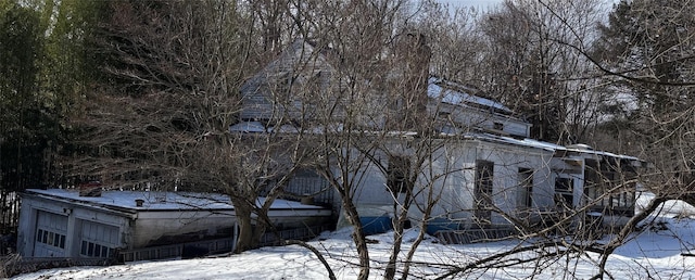 view of snow covered property