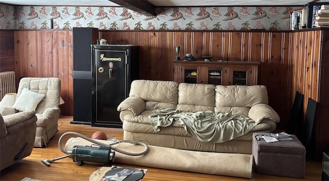 living room with radiator and light wood-type flooring