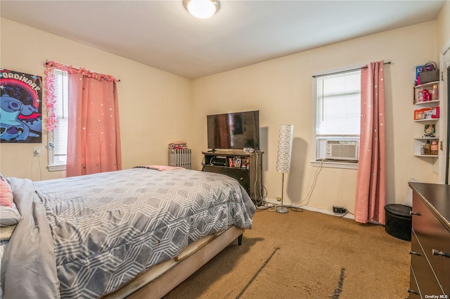 bedroom with carpet floors and cooling unit