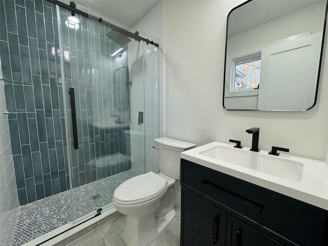 bathroom with vanity, toilet, and walk in shower