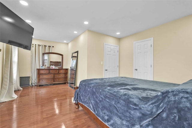 bedroom featuring hardwood / wood-style flooring