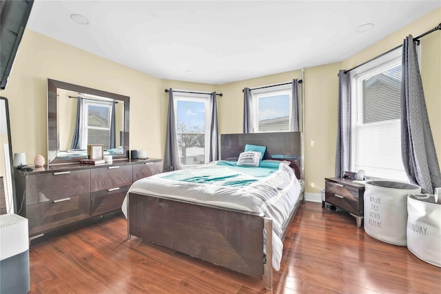 bedroom featuring dark hardwood / wood-style floors