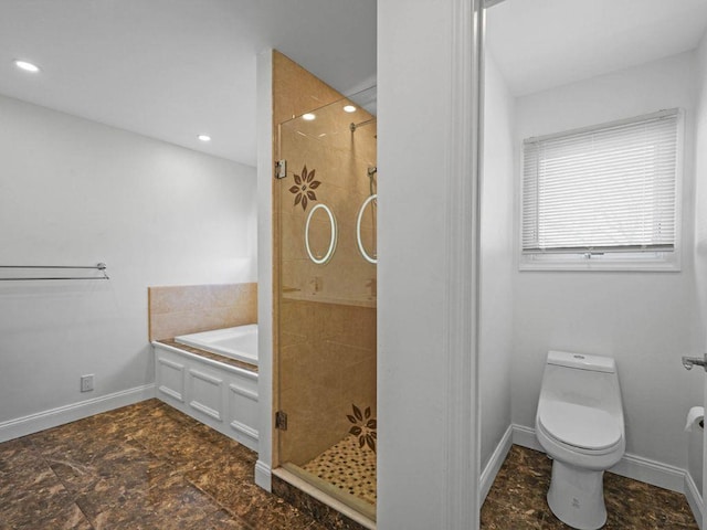 bathroom featuring plus walk in shower and toilet