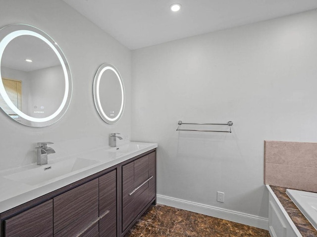 bathroom featuring vanity and a bathtub