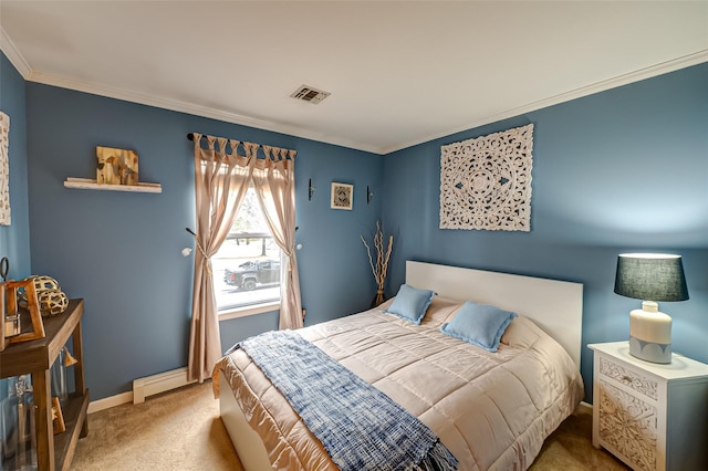 bedroom with crown molding and carpet floors