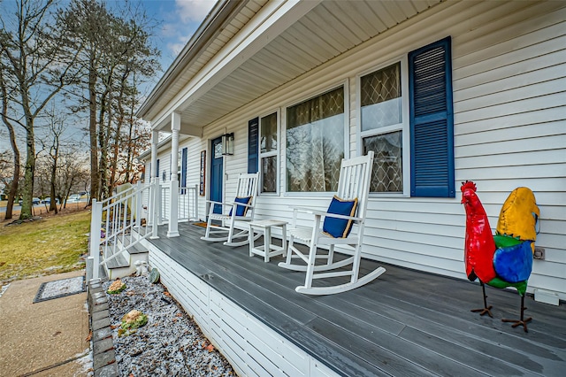 wooden terrace featuring a porch