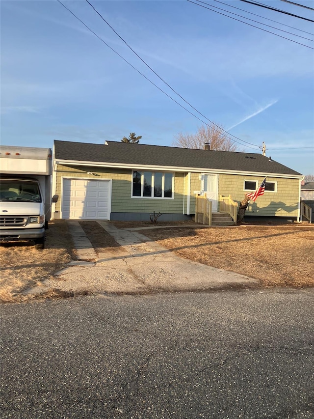 single story home with a garage