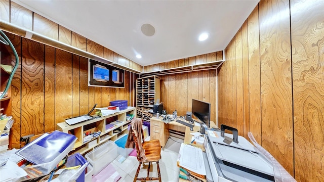 office area featuring wooden walls