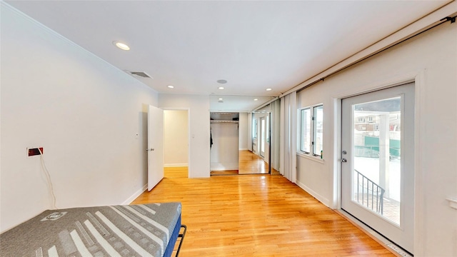 hallway with wood-type flooring