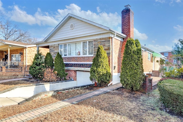 view of front of property with a garage