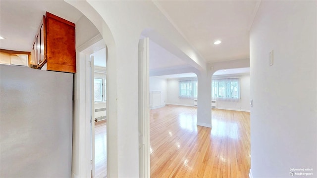 hall with light hardwood / wood-style flooring