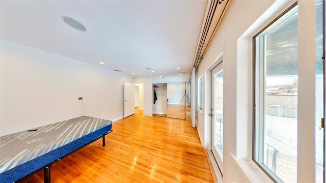 hallway with wood-type flooring