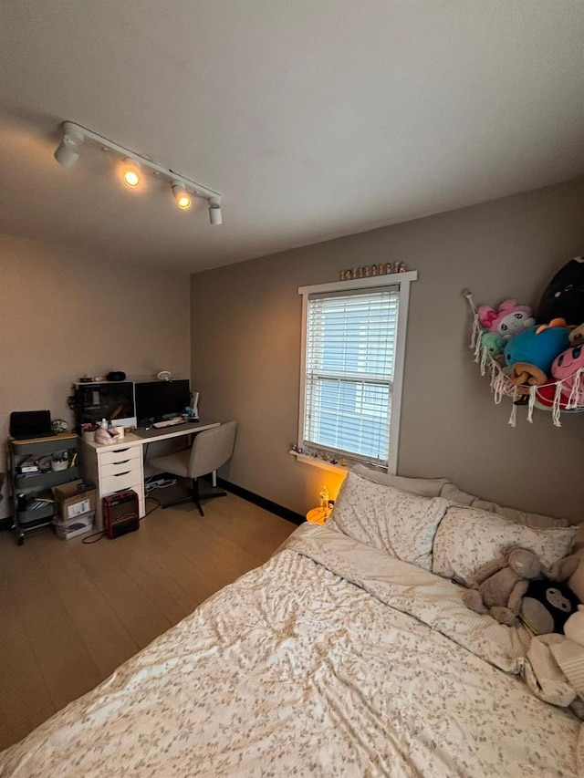 bedroom featuring hardwood / wood-style floors