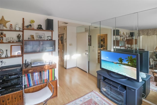 living room with light hardwood / wood-style floors