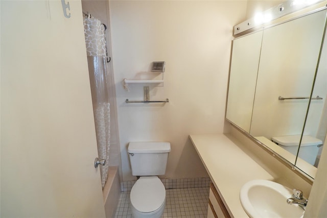 full bathroom with vanity, toilet, tile patterned flooring, and shower / bath combo with shower curtain